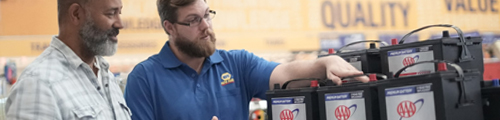 auto mechanic working on car