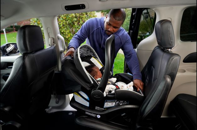 Infant in a rear facing car seat 