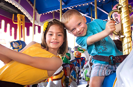 Kids at Carnival on Carousel