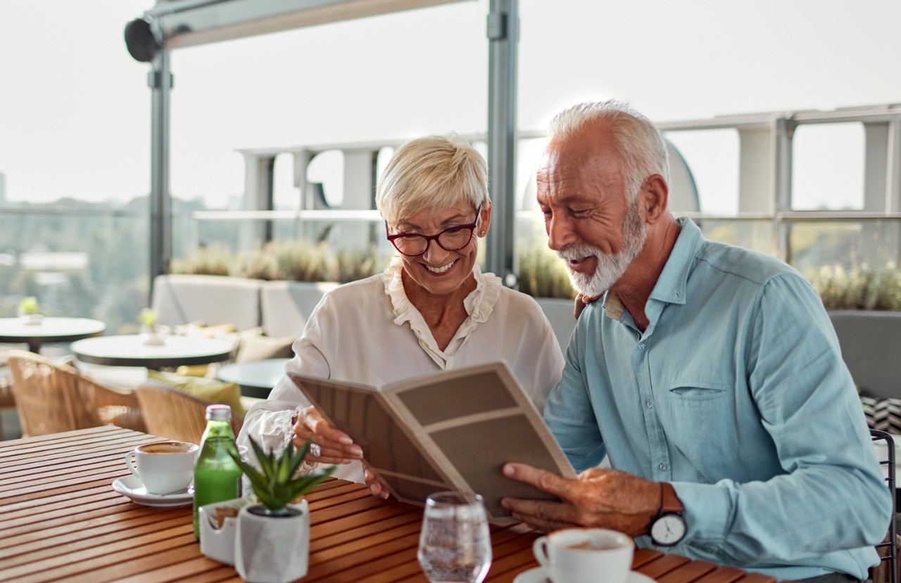 Older Couple reading pamplet