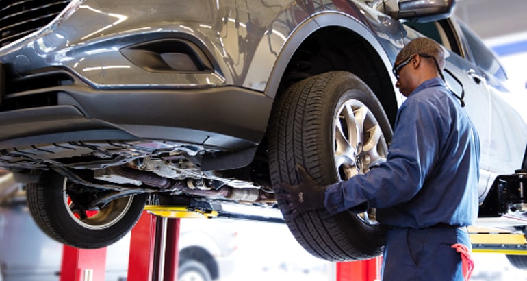 Mechanic replacing a car's tires