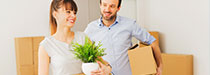man and woman in new apartment