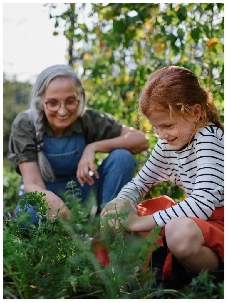 grandma with life insurance thru AAA gardening with granddaughter