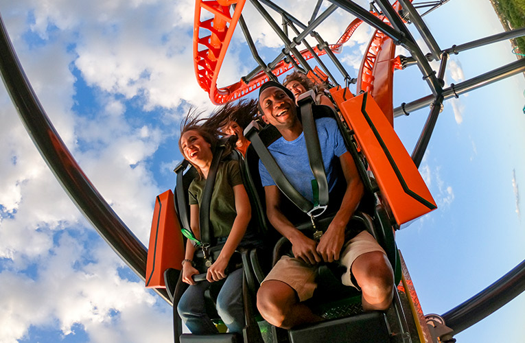 people on a rollercoaster